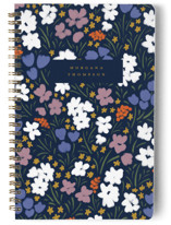 This is a blue journal by Ashlee Townsend called Dancing Meadow with standard printing on premium cover stock in notebook.