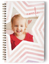 This is a pink journal by letterfix called Star with standard printing on premium cover stock in notebook.